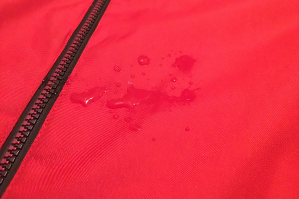 Red mountain parka before reproofing