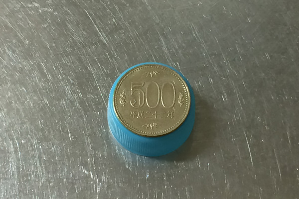 A 500 yen coin is roughly a bottle-cap size